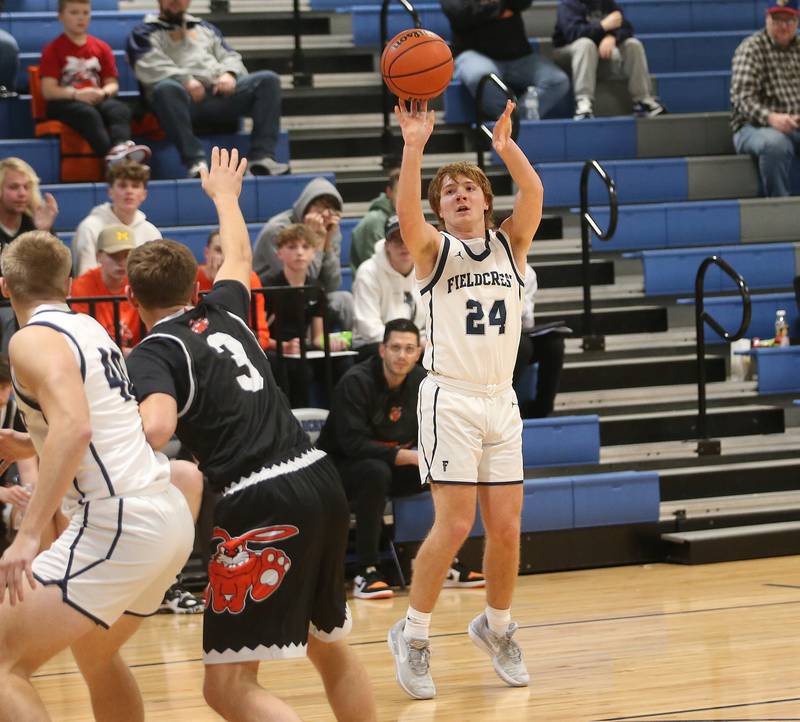 Fieldcrest's Dallas Cook shoots a wide-open jump shot againt Fisher on Tuesday, Jan. 2, 2024 at Fieldcrest High School.