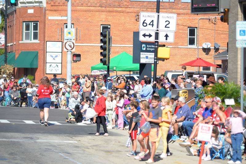 Kids wait for candy during the parade on Sunday, Oct. 6, 2024 during Autumn on Parade in Oregon.