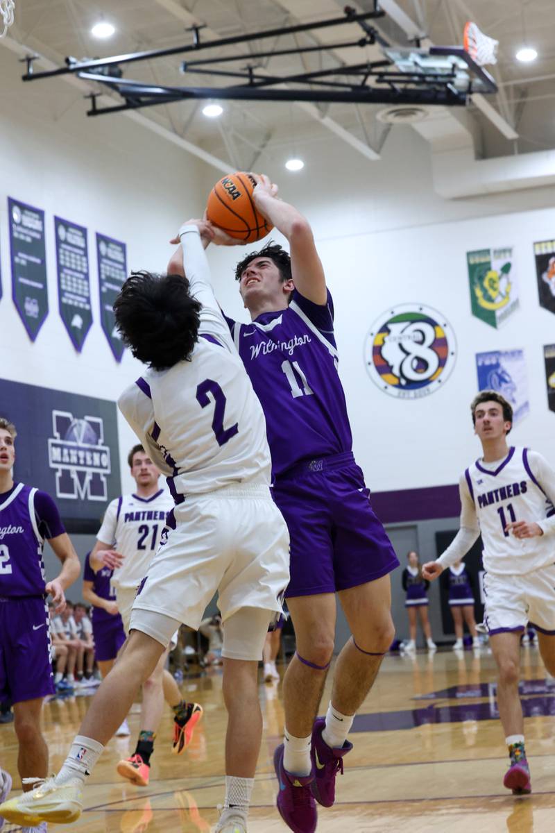Wilmington's Ryan Kettman shoots under pressure from Manteno's Quinn Campbell during Wilmington's 60-35 victory over Manteno on Tuesday, Feb. 17, 2026.