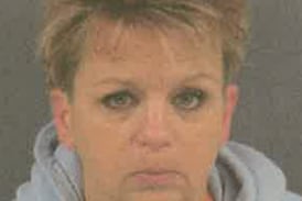 Fulton woman, 52, charged with robbery, armed violence, drug possession