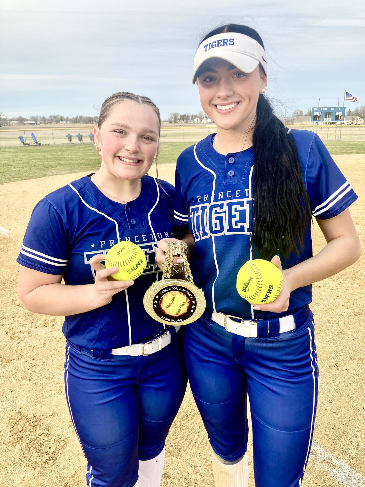 Avah Oertel (left) and Keely Lawson  combined for four hits and six RBIs to lead the Tigresses to a 9-4 win over Chillicothe IVC in Friday’s home opener at Little Siberia Field. Each homered.