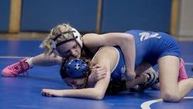 Photos: Wrestling at Newman High School with Newman, Princeton and Lena-Winslow