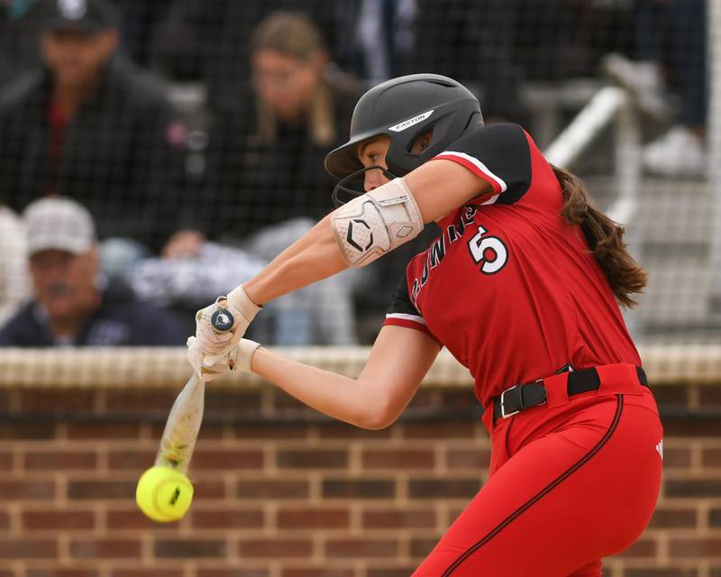Benet Academy's Noel Klody (5) makes contact with the ball during the regional final game against Oswego on Friday May 22, 2026, where the game was played at Oswego High School.