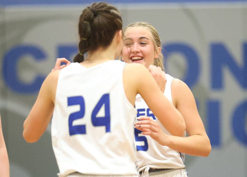 Princeton's Kiyrra Morris reacts with teammate Keighley Davis after defeating Illinois Valley Central in the Princeton High School Girls Basketball Holiday Tournament on Saturday, Nov. 22, 2025 at Princeton HIgh School. The Tigers won in double overtime.