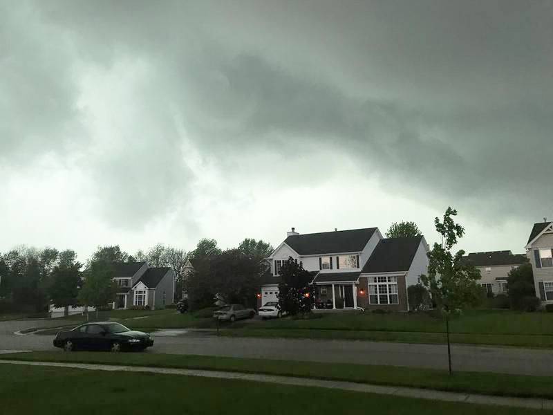 FILE PHOTO: Storm clouds pass through an Oswego neighborhood during a tornado warning issued by the National Weather Service. (Shaw Media photo)