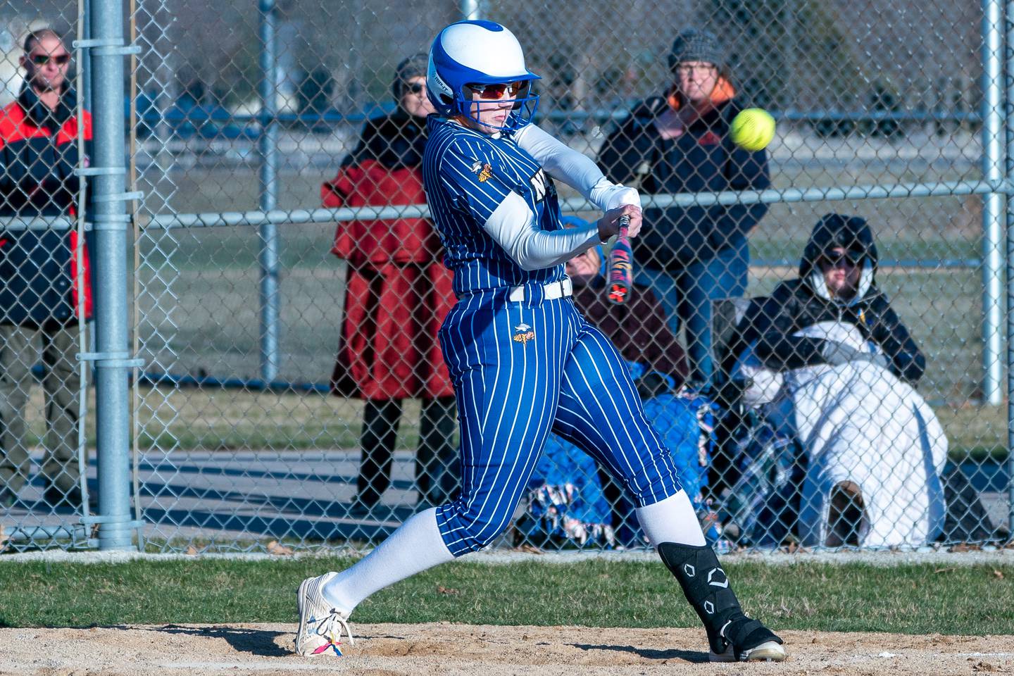 Newark’s Breannyn Dixon (24) hits a two run homer against Batavia during a softball game at Batavia High School on Wednesday, Mar 29, 2023.