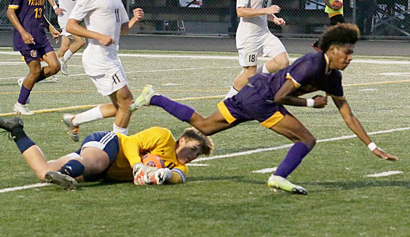 Bloomington Central Catholic's keeper Auston Koch blocks a shot from Mendota's Jasiel Watson (10) on Wednesday, Sept. 14, 2022 in Mendota.