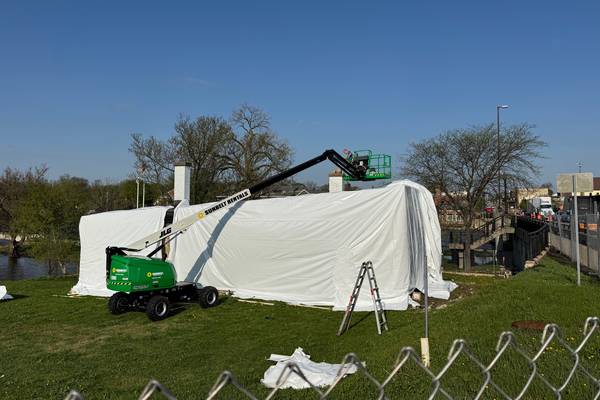 Geneva’s historic blacksmith shop gets covered in plastic - city gives 10 days to take it down