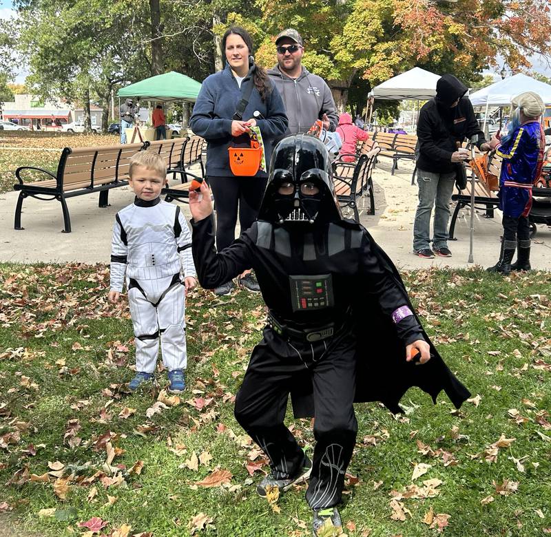 Darth Vader, aka Harlan Fry, 7, of Mt. Morris, plays a game at the Evangelical Free Church of Mt. Morris Trunk or Treat and Fall Family Festival in Mt. Morris on Sunday, Oct. 13, 2024.