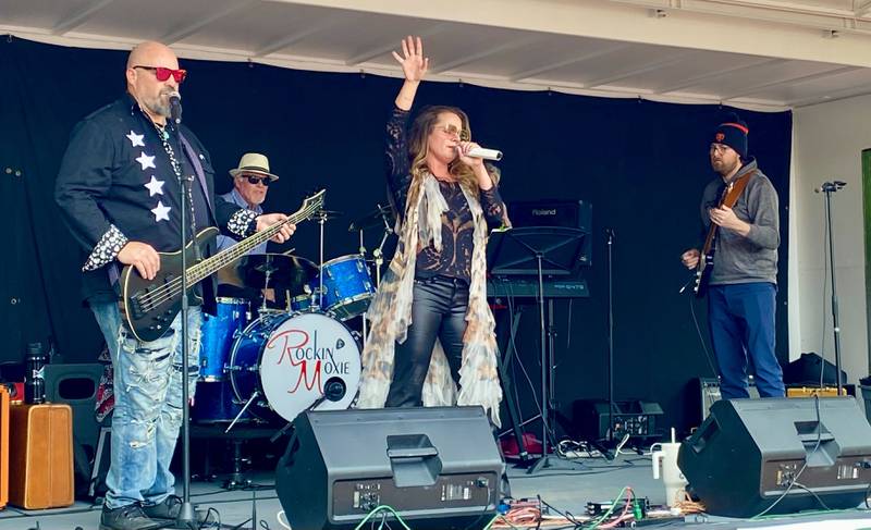 Rockin' Moxie performs on Sunday, May 4, 2025, in the Frank Van Buer Plaza in downtown DeKalb for the city's annual Cinco de Mayo Celebration.