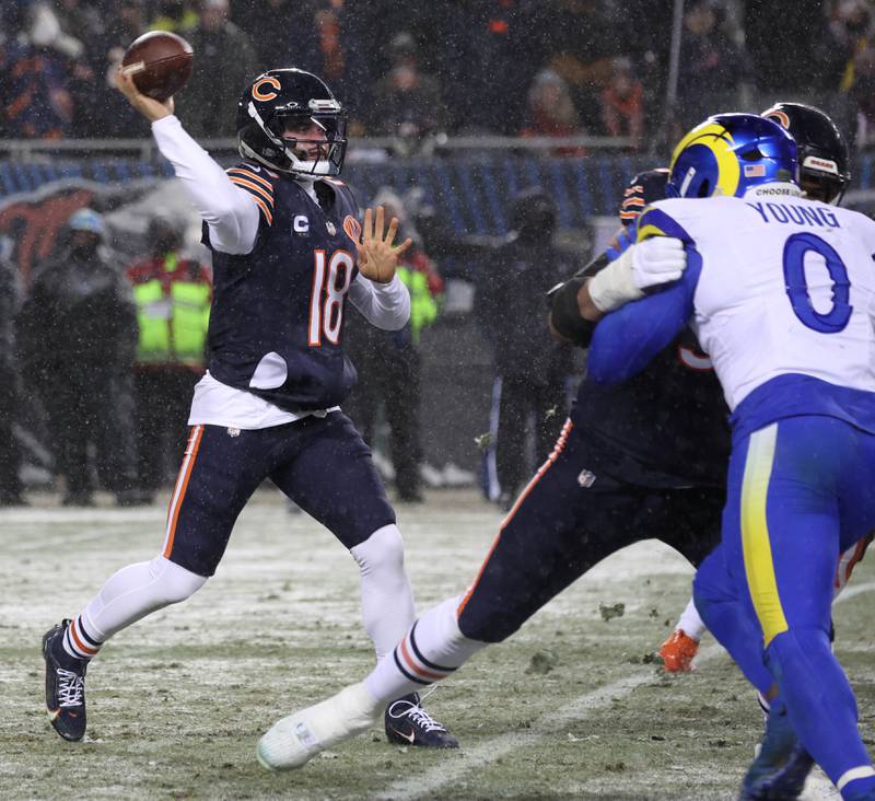 Chicago Bears quarterback Caleb Williams throws a pass Sunday, Jan. 18, 2026, during their NFC divisional playoff matchup against the Los Angeles Rams at Soldier Field in Chicago.