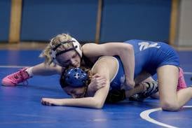 Photos: Wrestling at Newman High School with Newman, Princeton and Lena-Winslow