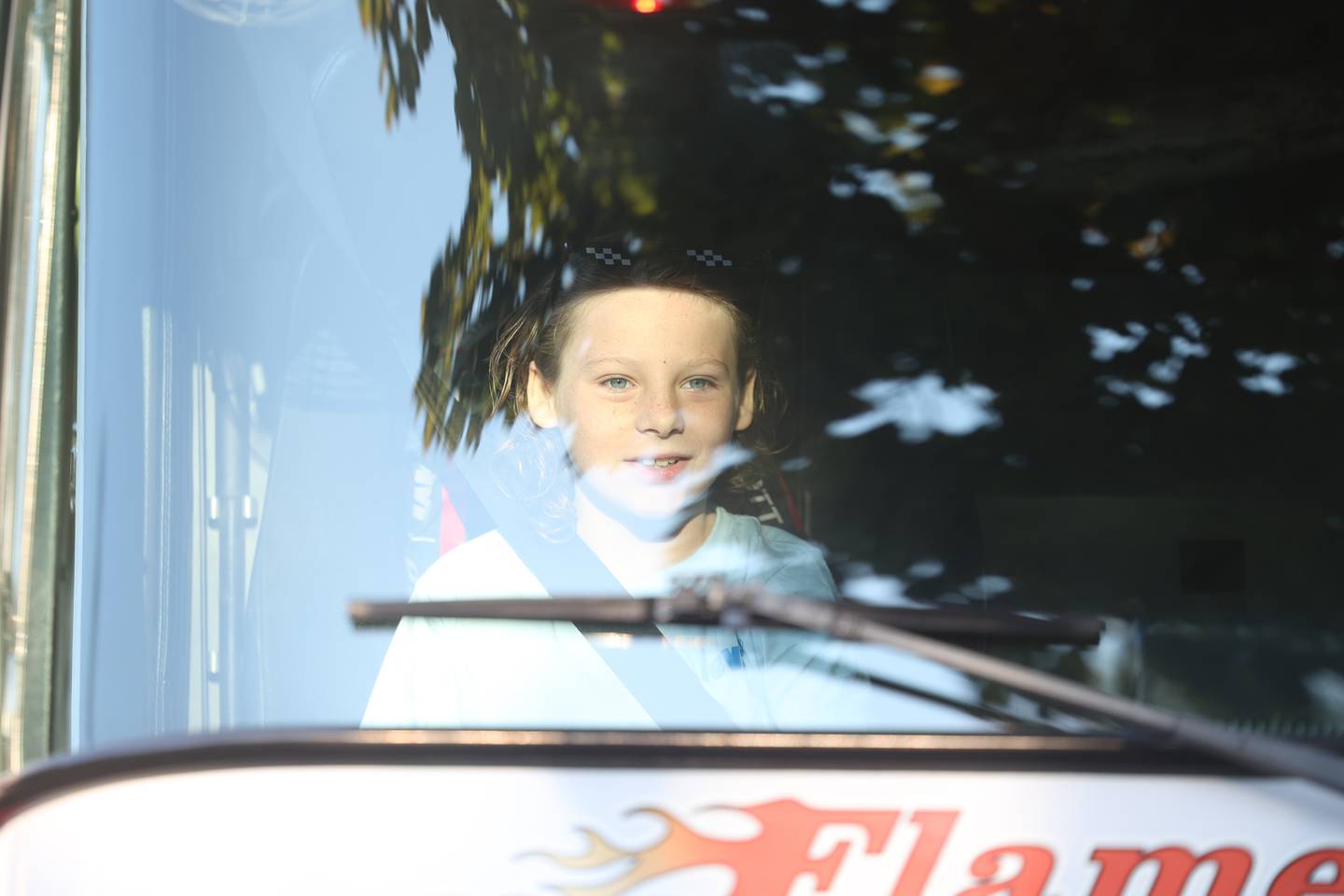 4th grader William Zaffino won a raffle to get a ride in a fire truck to his first day of school at Eisenhower Academy in Joliet. Wednesday, Aug. 17, 2022, in Joliet.