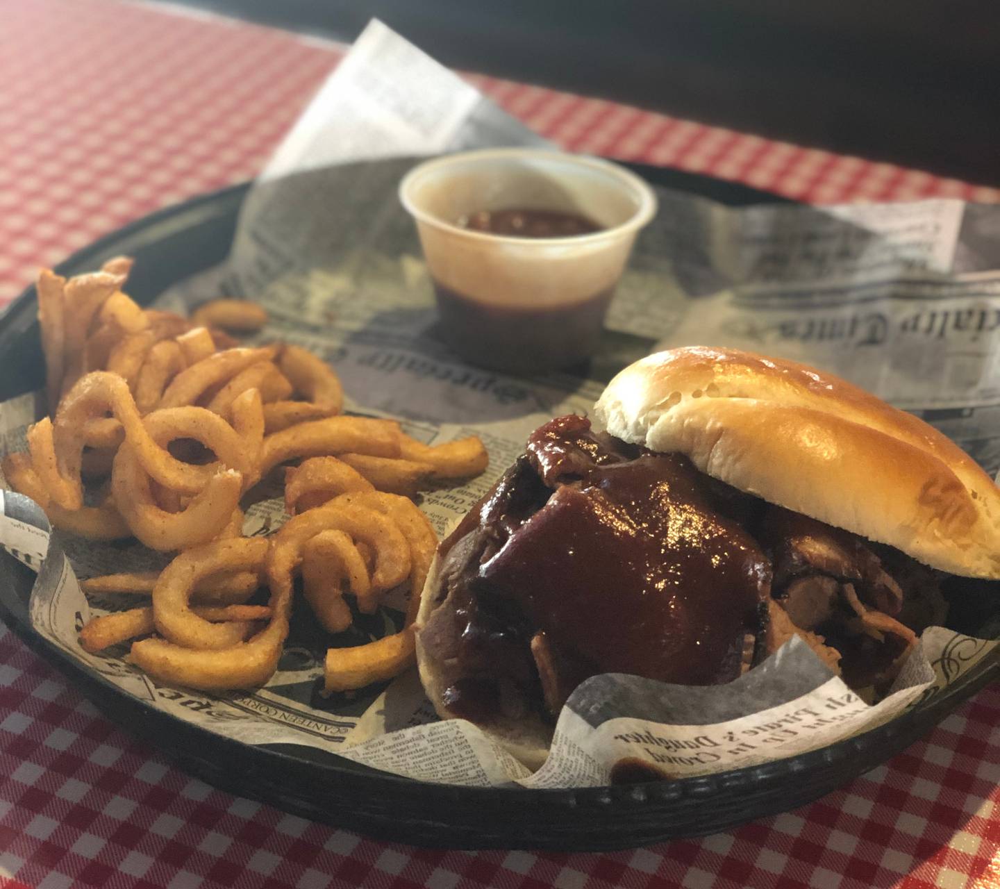 The beef brisket comes hot and ready at the table with any side of potato and choice of either beans or cole slaw.