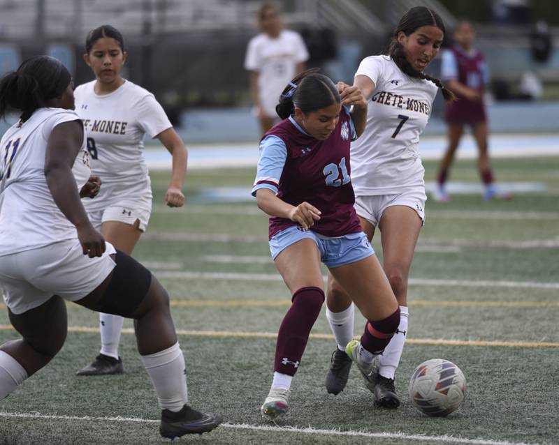 Kankakee's Jocelyn Sanchez and Crete-Monee's Delilah Gonzalez play the ball in the box in a game on May 12, 2025.