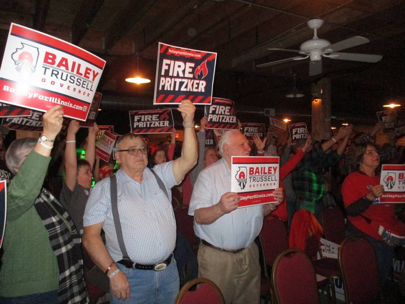 Kendall County Republicans show their support for gubernatorial candidate Darren Bailey, a state senator, and opposition to Democratic Gov. J.B. Pritzker, during a rally on March 3, 2022 in Plano. (Mark Foster -- mfoster@shawmedia.com)