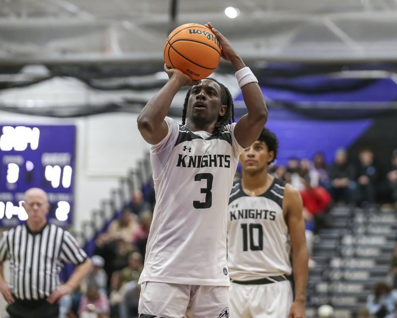 Kaneland's Marshawn Cocroft (3) shoots a free throw during their Plano Christmas Classic semi-final basketball game between Kaneland at LaSalle Peru Monday, Dec 29, 2025 in Plano.
