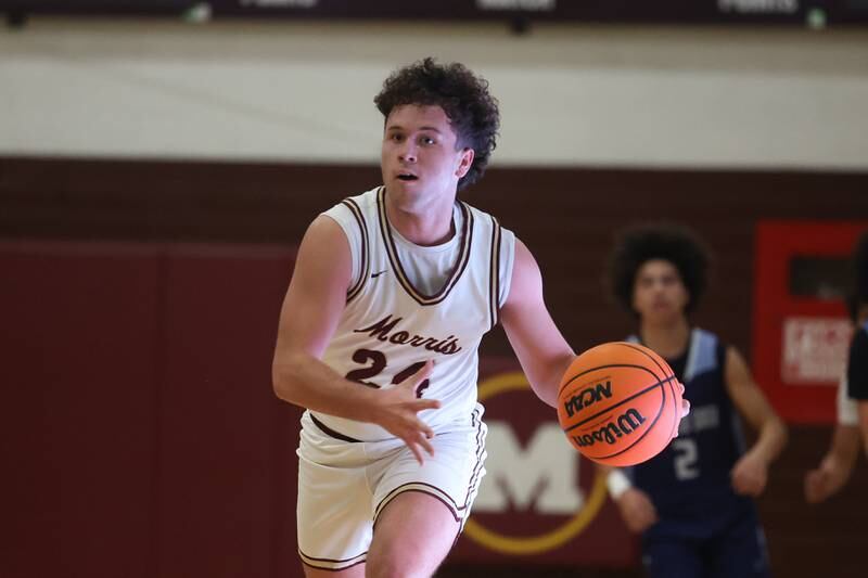 Morris’ Brandon Pearce looks for a play against Plainfield South on Wednesday, Jan 29, 2025 in Morris.
