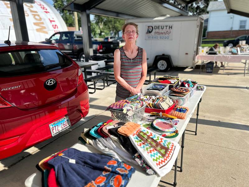 Vera Adams of Mt. Morris stands behind some of the items she had for sale at the Polo Farmer's Market on Thursday, Aug. 7, 2025. The market is held each Thursday from 3-6 p.m., weather permitting, at the Pavilion located on the southeast corner of South Division and Buffalo Street.