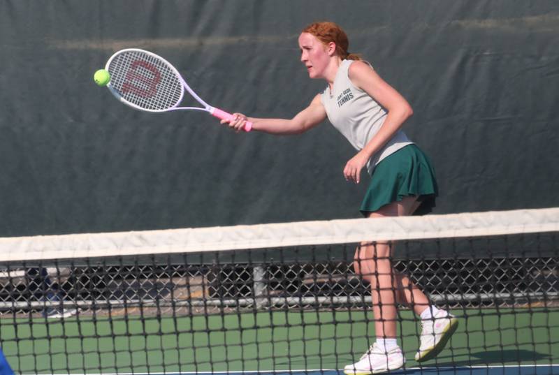 St. Bede's Lily Soliman returns a serve during the Class 1A girls tennis sectionals on Thursday, Oct. 16, 2025 at Ottawa High School.
