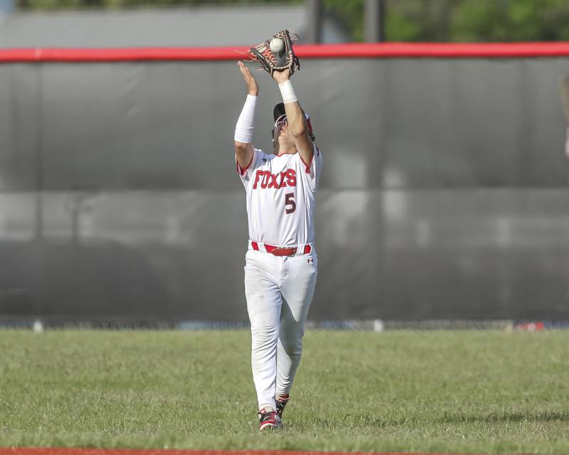 Yorkville's Nick Parashis (5) makes a catch in center field during baseball game between Oswego East at Yorkville. Monday, May 12, 2025 in Yorkville.