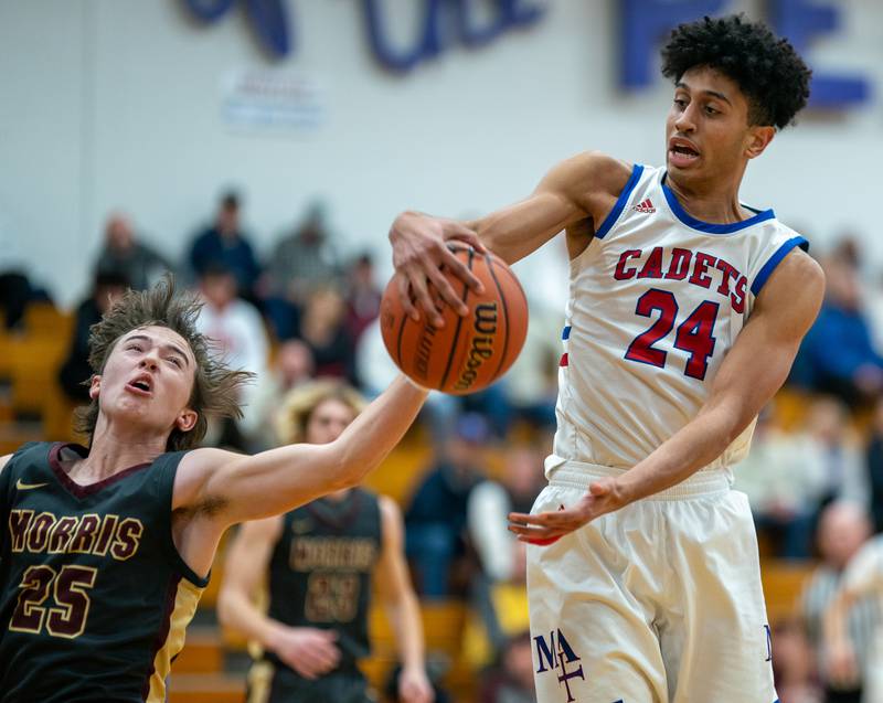 Photos Marmion vs. Morris basketball at the 59th Plano Christmas Classic Shaw Local