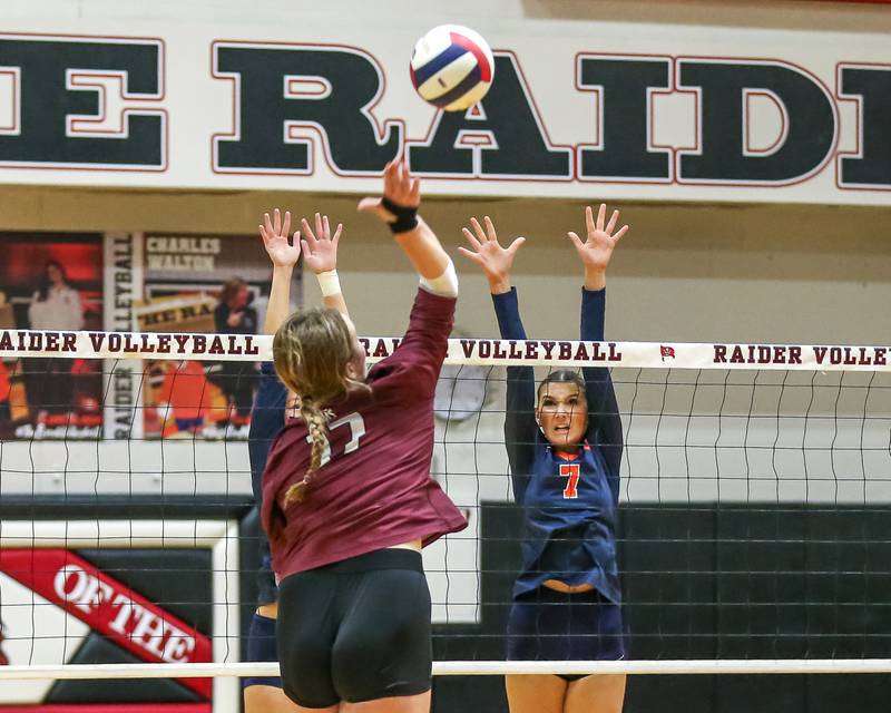 Oswego's Hannah Herrick (7) attempts to block Lockport's Bridget Ferriter (17) shot during Class 4A Bolingbrook Sectional final match between Lockport at Oswego.  Nov 7, 2024  in Bolingbrook.