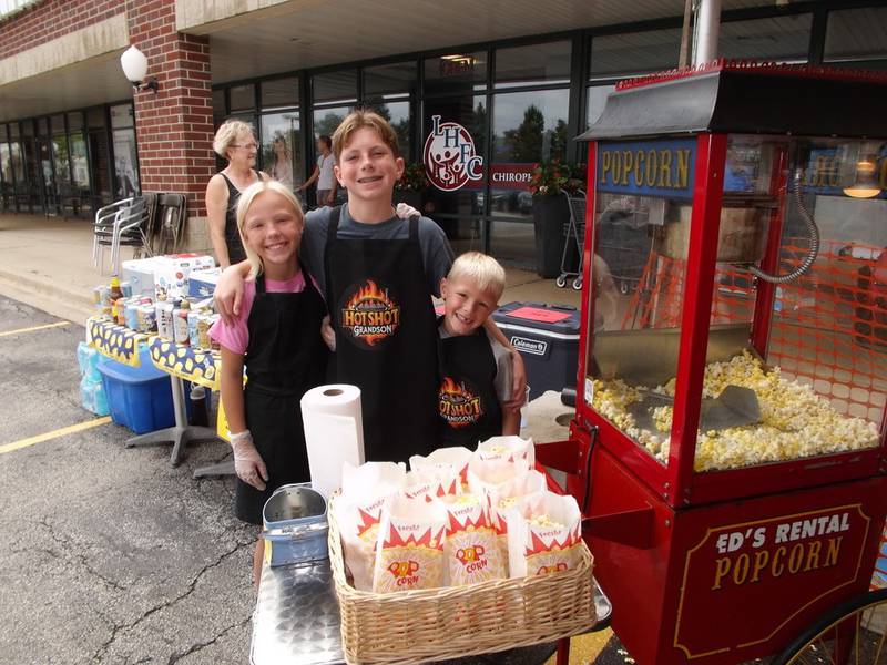 Macy Zimmerman, Spencer Neil and Maddox Zimmerman celebrating the 25th anniversary of Butcher on the Block in Lake in the Hills weekend of Aug. 15, 2025.