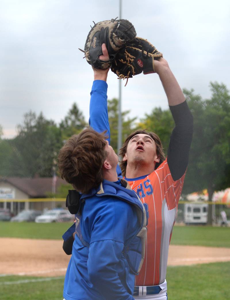 Eastland first baseman Zy Haverland and catcher Brody Sims go after a pop up during action against River Ridge/Scales Mound at the 1A Lena-Winslow Sectional on Wednesday, May 28, 2025. The Cougars lost the game 5-4.