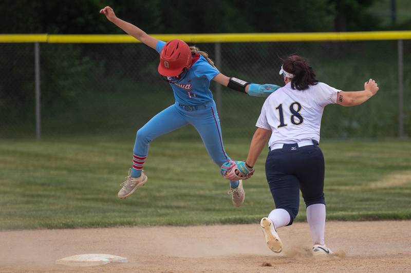 Rylee Harsted (11) of Ottawa jumps to avoid being tagged by Natalie Pacyga (18) of Lemont on Tuesday, June 3, 2025 at Ottawa High School in Ottawa.