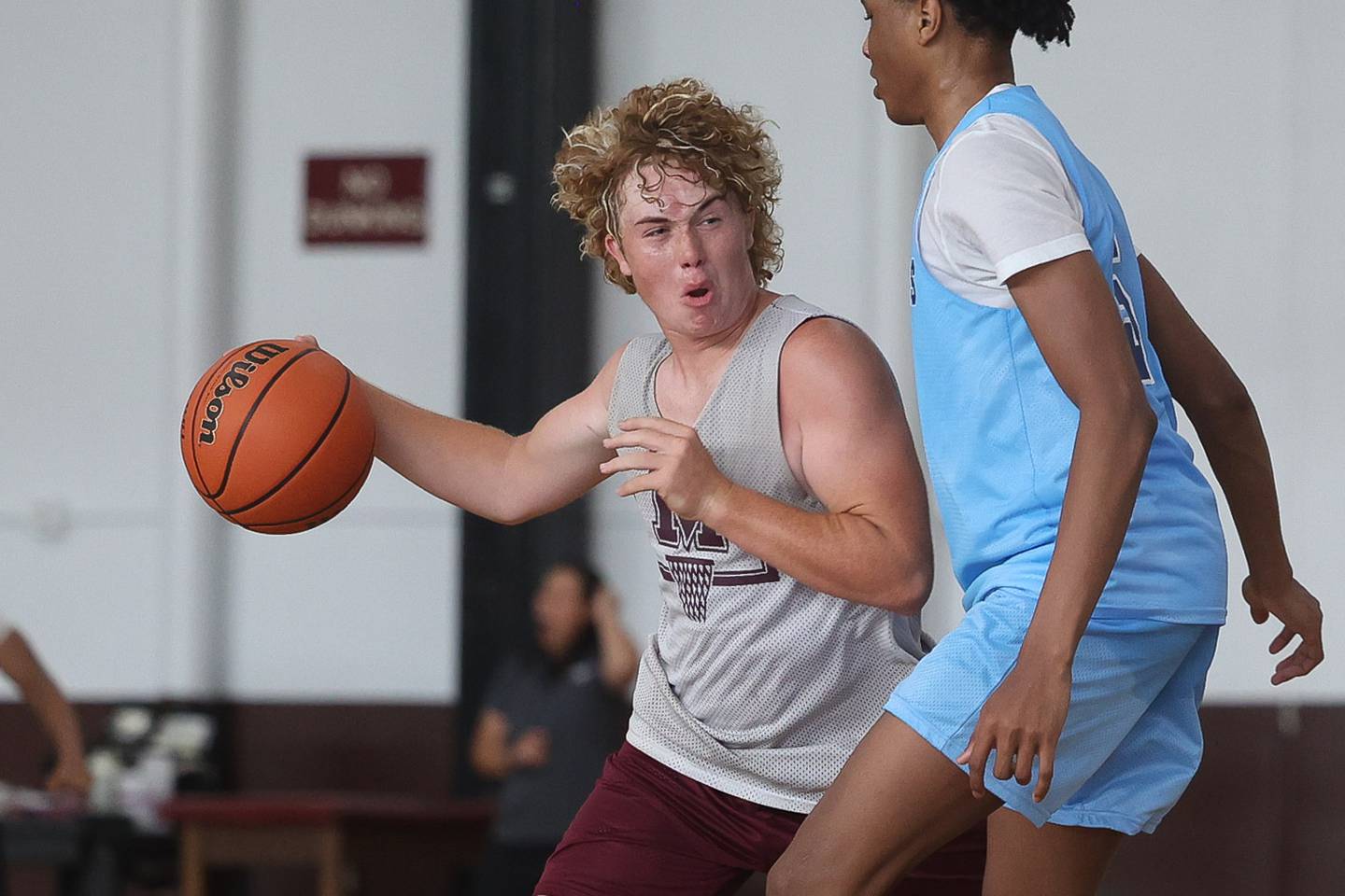 Morris’ Trey Olson looks to pass out of pressure against Plainfield South at the 37th Morris Boys Shootout on Tuesday, June 25, 2024.
