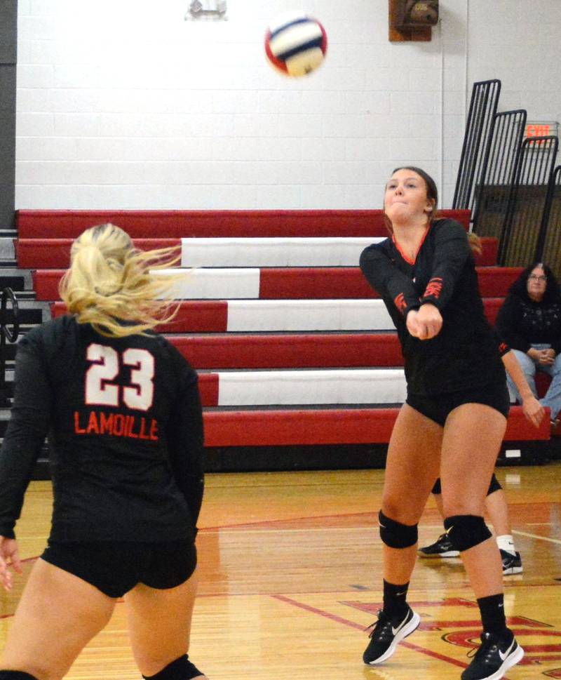 LaMoille's Grace Kelly makes a pass in Tuesday's match with Henry-Senachwine at LaMoille.
