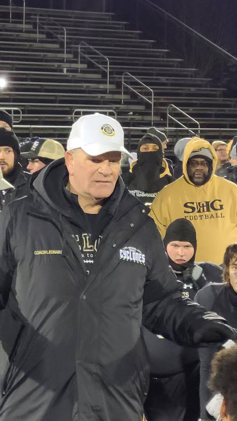 Sacred Heart Griffin coach Ken Leonard addresses both teams following his team's 56-42 victory in a Class 4A semifinal round matchup on Friday night.
