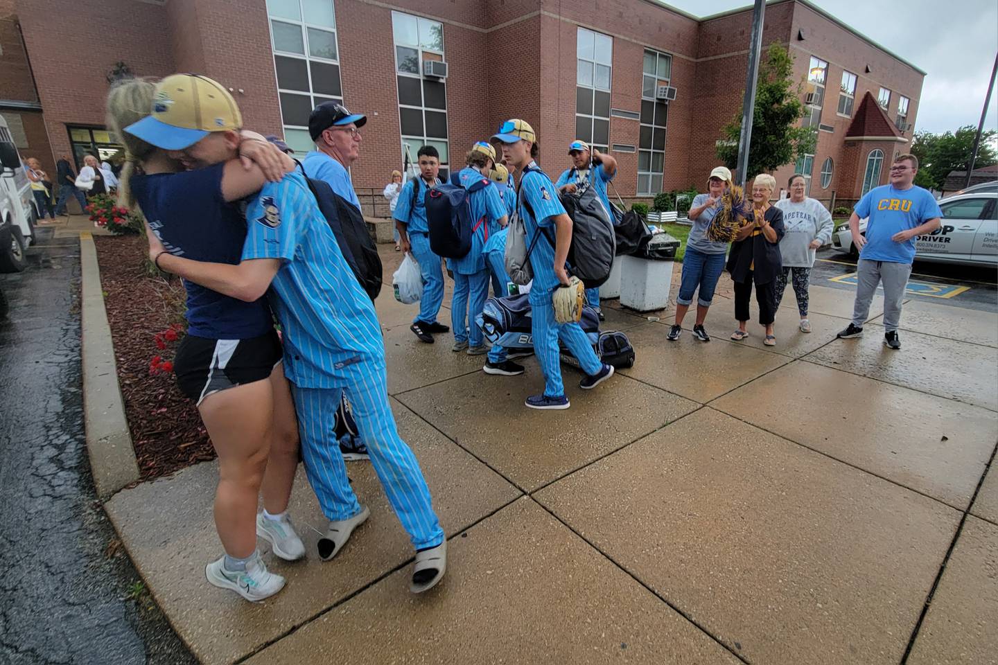 The Marquette baseball state champions are welcomed back to Bader Gym following the state championship win over Altamont on Saturday.