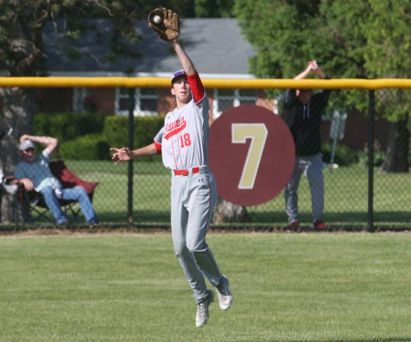 Ottawa's Jack Henson fields a ground ball as it bounces above his head against Rock Island during the Class 3A Regional semifinal game on Thursday, May 25, 2023 at Morris High School.