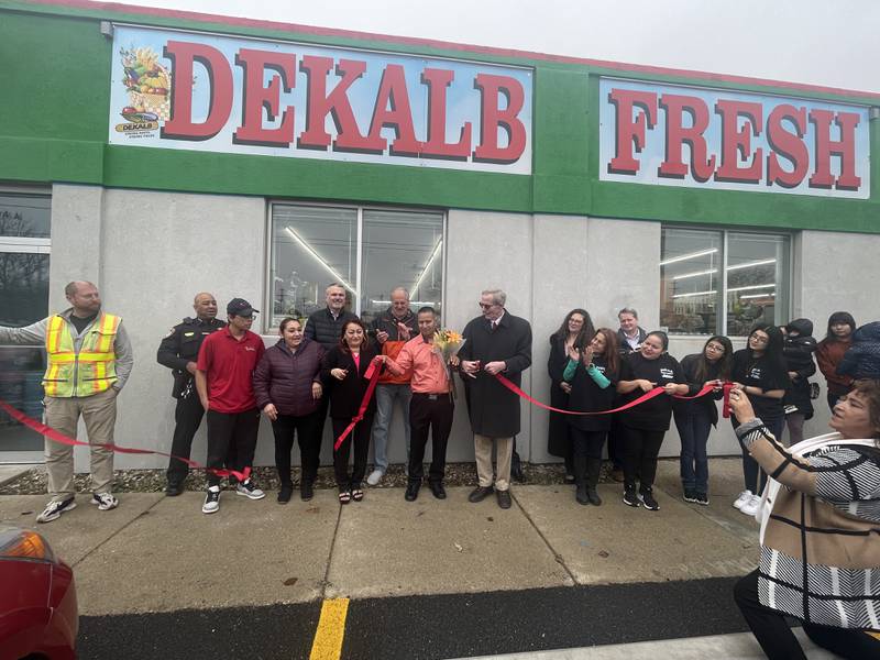 DeKalb Fresh Market joined with city leaders, residents and community members on Tuesday, Nov. 21, 2023, for a ribbon cutting celebration to mark the start of business at the store at 304 N. Sixth St., in DeKalb.