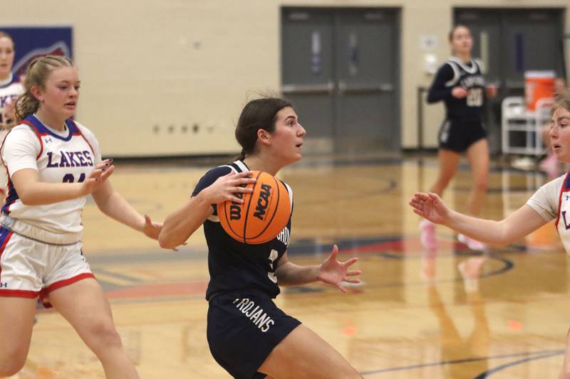 Cary-Grove’s Kennedy Manning moves the ball against Lakes in varsity girls basketball action on Friday, Jan. 2, 2026  at Lakes High School in Lake Villa.