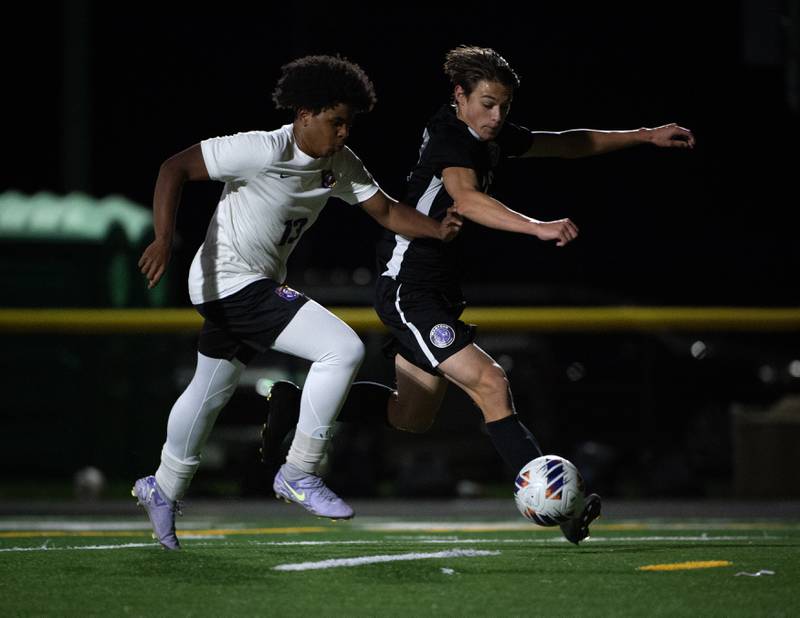 Manteno's Ben Froeschle, right, leads on a break away as Chicago Christian's Caleb Daniels, left, defends during a sectional game on Tuesday, October 28, 2025.