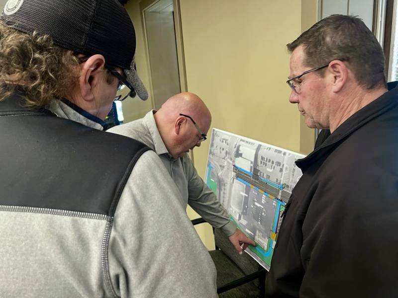 Visitors view renderings of Sterling's Second Street road construction project during an open house on April 8, 2025.
