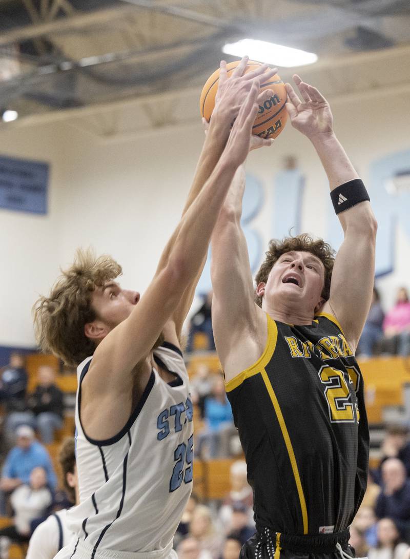 Riverdale’s Jacob Watson has a shot blocked by Bureau Valley’s Landon Hulsing Wednesday, Feb. 26, 2025, at the Class 2A Regional semifinal at Bureau Valley High School.