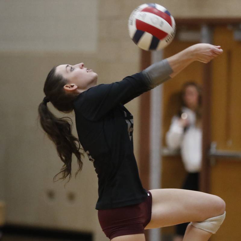 Prairie Ridge's Julia Reina hits the ball over the net during a Fox Valley Conference volleyball match against Huntley on Tuesday, Oct. 8, 2024, at Huntley High School.