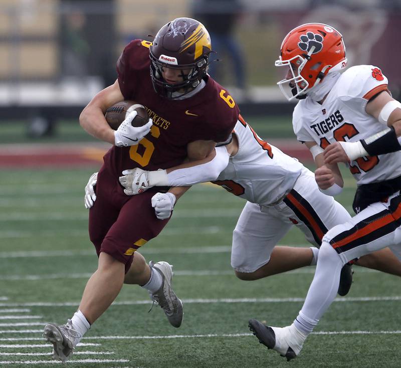 Richmond-Burton's Hunter Carley is tackled by Byron’s Dylan Dash during an IHSA Class 3A semifinal playoff football game on Saturday, November 22, 2025, at Richmond-Burton High School, in Richmond.