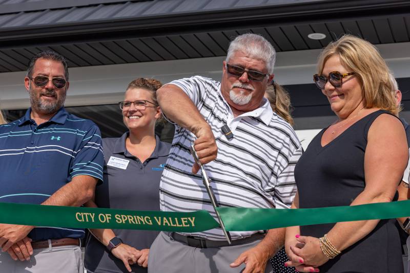 Fourth Ward Alderman Dave Pellegrini cuts the grand opening ribbon for the concession stand at the Spring Valley Mini- Park on August 7, 2025 in Spring Valley.