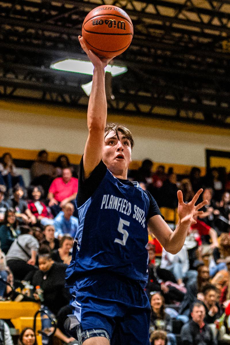 Plainfield South's Devin Tyda lays up a shot during a game against Joliet West Tuesday Feb. 14, 2023 at Joliet West  High School
