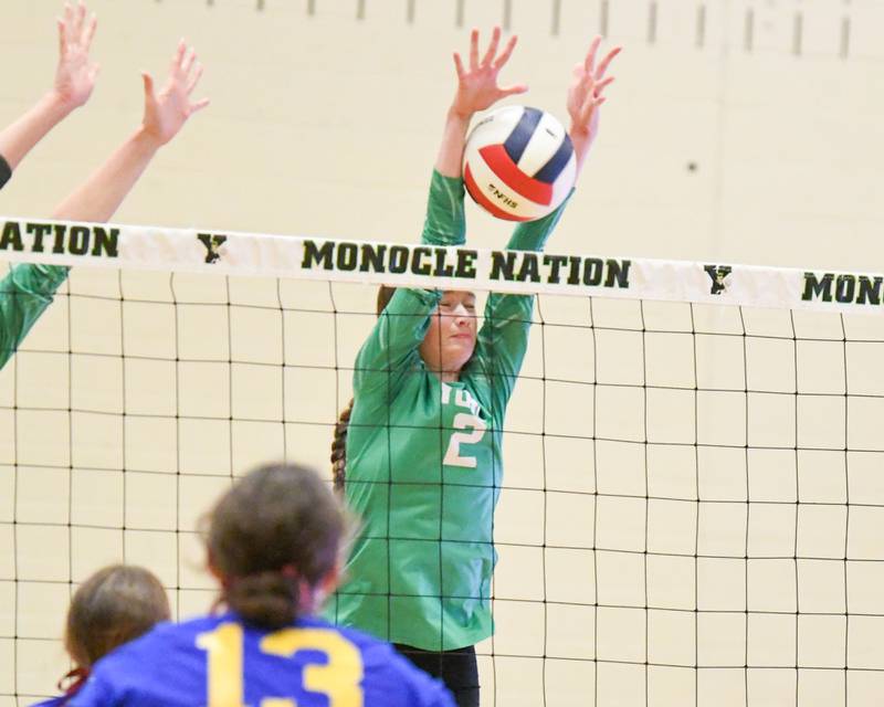 York's Eileen Carroll (2) blocks the ball at the net during the regional title game while taking on Lyons Township on Thursday Oct. 30, 2025, held at York High School.