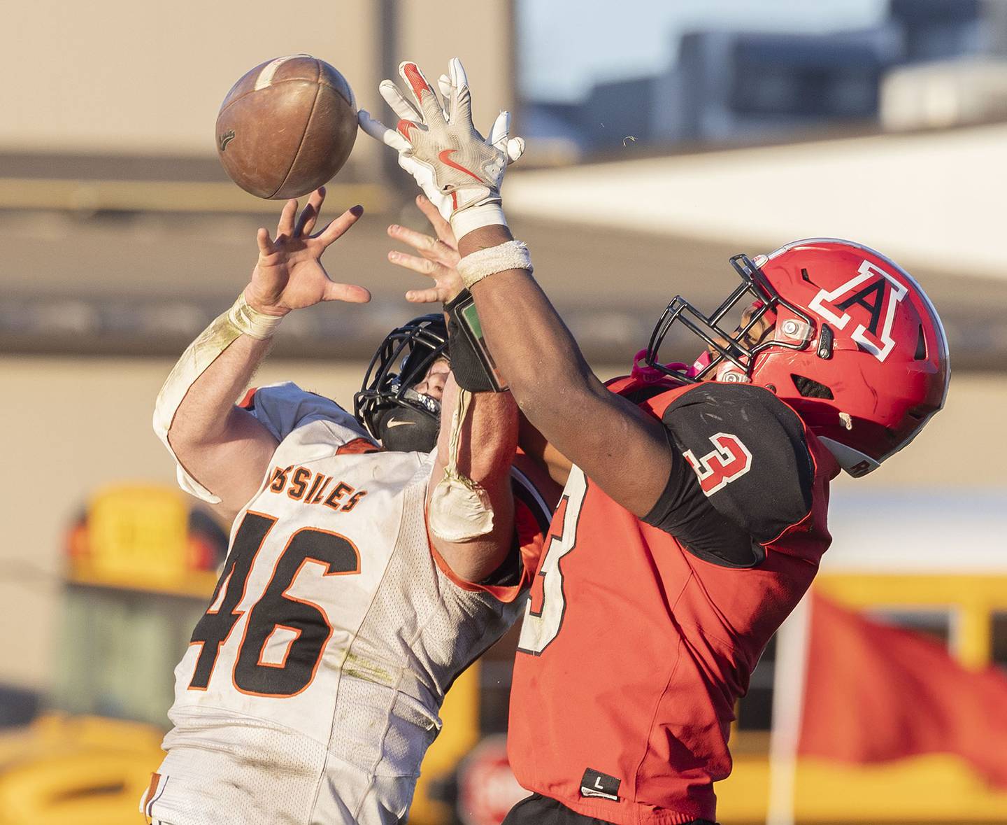 Milledgeville’s Spencer Nye works against Amboy’s Cody Winn on a pass Saturday, Nov. 15, 2025, in the 8-man football semifinal. Winn was called for defensive pass interference.