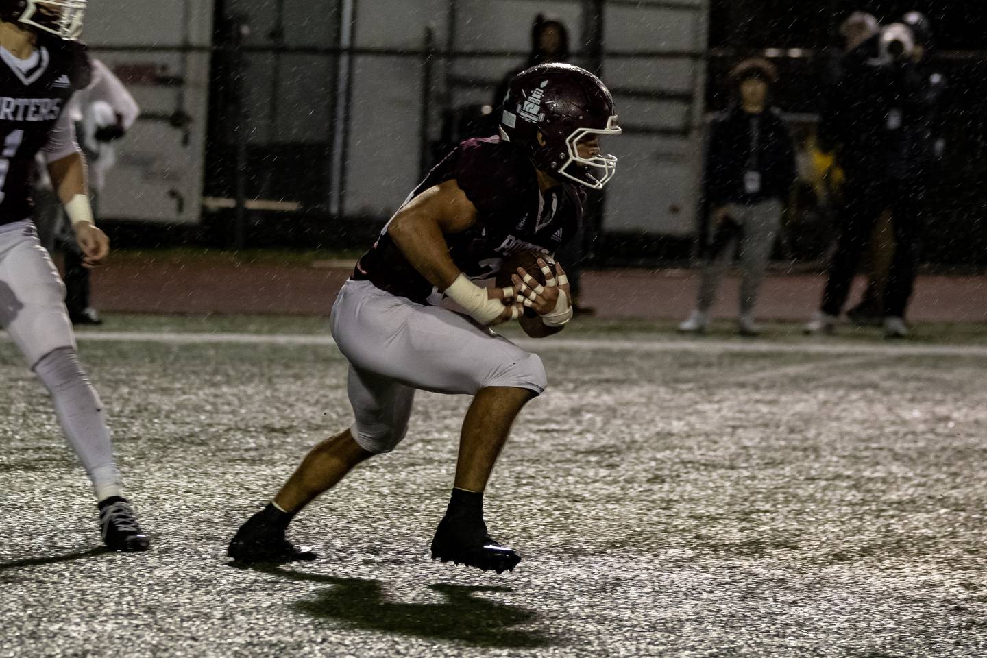 Lockport's Chris Miller looks for an opening during an 8A varsity football playoff game against Homewood-Flossmoor at Lockport Township High School East Campus on Nov. 8, 2025.