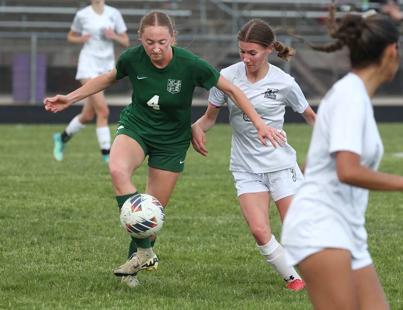 Kaneland's Zoe Gannon (right) and Boylan's Zoey Schmidt go after the ball Wednesday, May 28, 2025, during their Class 2A sectional semifinal game at Belvidere High School.