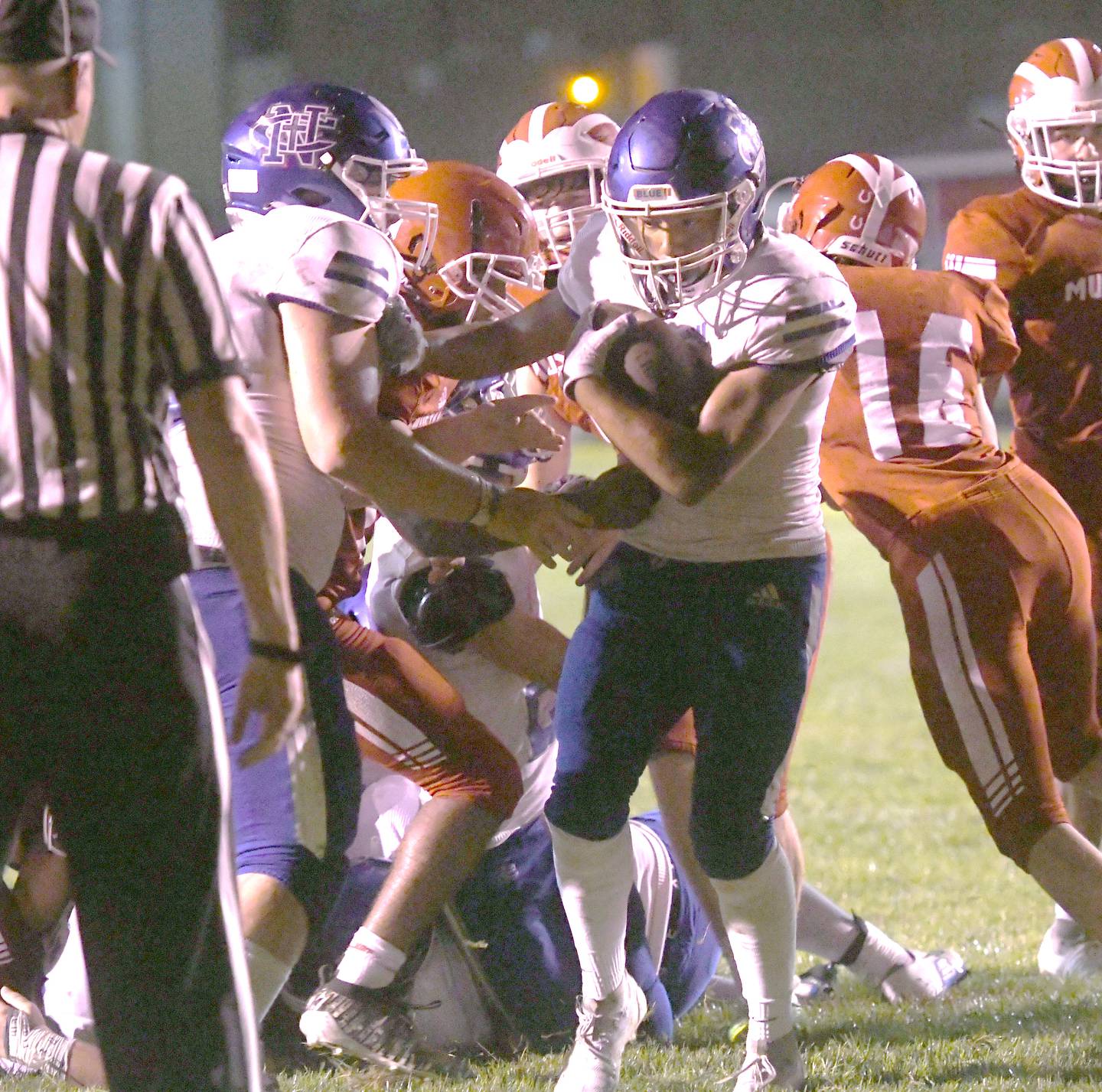 Newman's Gabe Padilla fights his way into the endzone during second half action against Morrison on Friday, Aug. 26, 2022.