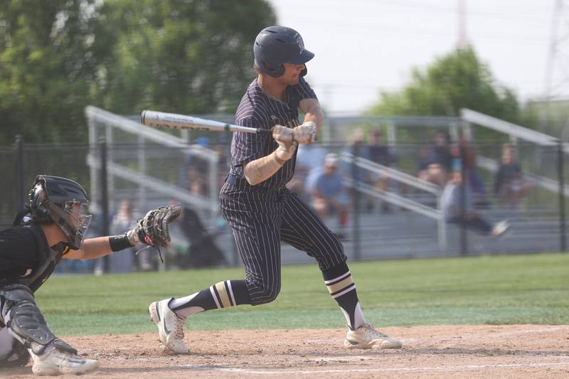 Lemont’s Joe Pender singles against Hinsdale South on Wednesday, May 24, 2023, in Lemont.